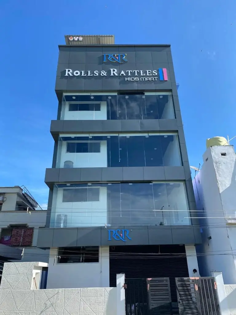 Rolls & Rattles Kids Mart showroom exterior in Poranki, Vijayawada